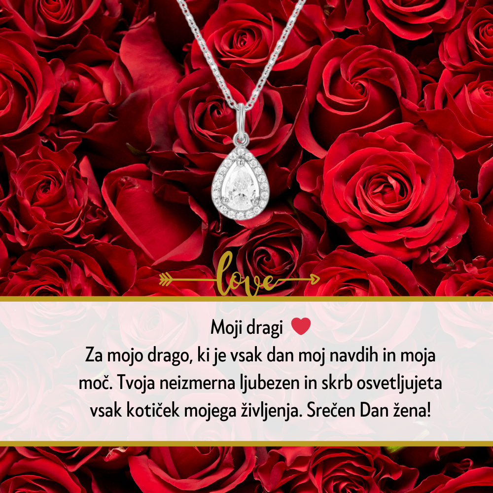 Personalizirana srebrna verižica z vgraviranim imenom in datumom, obdana z majhnimi kristali, kot idealno darilo za Dan žena. Elegantna darilna škatla na beli podlagi z rdečo vrtnico ob strani, simbolizira ljubezen in spoštovanje na poseben dan